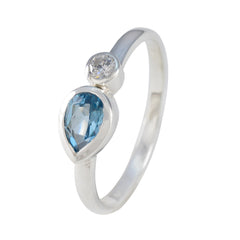 Nora blue toi et moi ring sterling silver with pear shaped blue gemstone and round white diamond accent