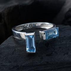 Emma silver ring featuring two rectangular blue gemstones in blue toi et moi ring design