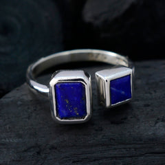 Camilla silver blue toi et moi ring with two rectangular blue stones on black background