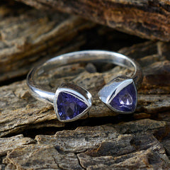 Soo jin blue toi et moi ring sterling silver open band with two triangular blue gemstones on rustic wood
