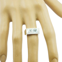 Stella silver blue toi et moi ring with two blue gemstones on finger