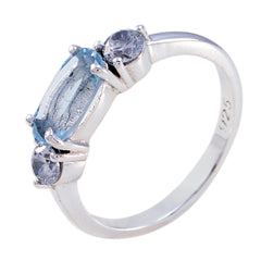 Emi blue trilogy gemstone ring with three blue stones set in silver band