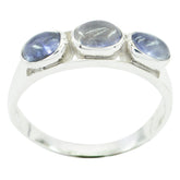 Emi blue trilogy gemstone ring in sterling silver with three bezel set blue cabochon stones on polished band