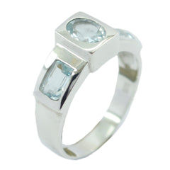 Ellie silver band with round center and two baguette aquamarine stones blue trilogy ring for women