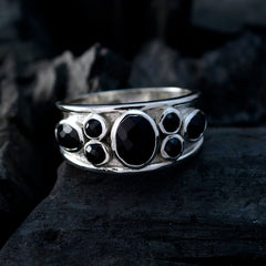Isla boho black gemstone ring with multiple faceted black stones set in silver band