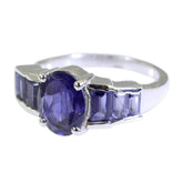 Hanna boho blue gemstone ring with oval center stone and tapered baguette side stones in silver