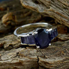 Hanna boho blue gemstone ring with oval navy center and baguette side stones in silver setting