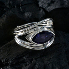 Stella boho blue toi et moi ring featuring a marquise blue gemstone in a silver twisted band