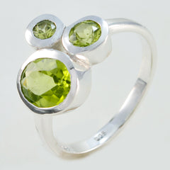 Victoria boho green gemstone ring with three vibrant green stones set in silver band