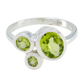 Victoria boho green gemstone ring with three round green stones set in silver band