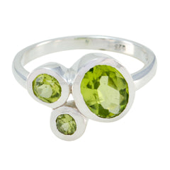 Victoria boho green gemstone ring with three round green stones set in silver band