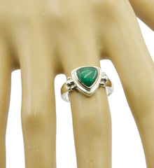Saanvi boho green solitaire ring with triangular green stone set in silver band on display hand
