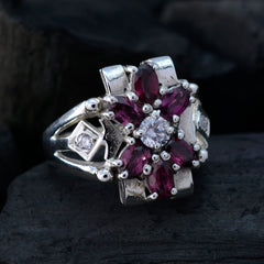 Angel boho multicolor gemstone ring featuring a central clear stone surrounded by deep red gemstones