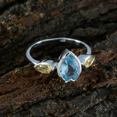 Sterling silver boho multicolor trilogy ring with pear blue topaz center and two yellow citrine side stones