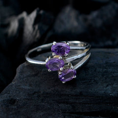 Laura boho purple gemstone ring with three oval purple stones set in a silver band
