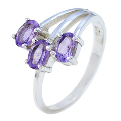 Laura boho purple gemstone ring featuring three oval purple stones set in a silver band