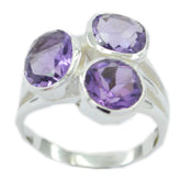 Nella boho purple gemstone ring featuring three faceted purple stones set in silver band