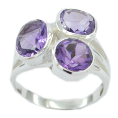 Nella boho purple gemstone ring featuring three faceted purple stones set in silver band