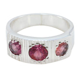 Siti boho red trilogy ring with three red gemstones set in a textured silver band