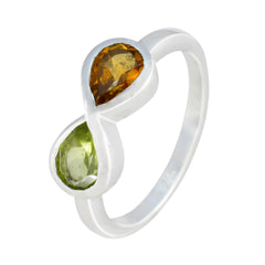 Yasmin boho toi et moi ring with pear-shaped green and amber gemstones set in silver band