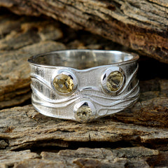 Pauline boho yellow gemstone ring with silver textured band featuring three yellow gemstones