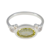 Haruka boho yellow gemstone ring with oval yellow center stone and silver band accents