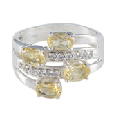 Yasmine boho yellow gemstone ring with four oval yellow stones and multiple small clear crystals
