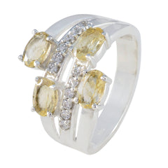 Yasmine boho yellow gemstone ring with four oval yellow stones and small clear accent gems in silver band