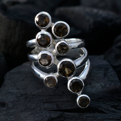 Nova brown Navratna ring with multiple round brown gemstones set in silver bands