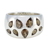 Isabel silver ring featuring multiple brown navratna stones in a unique teardrop design