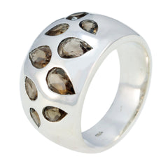 Isabel silver ring featuring multiple brown navratna gemstones in teardrop shapes
