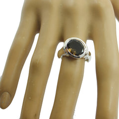 Carla brown solitaire ring for women featuring a large round brown stone set in silver band