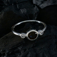 Wen brown trilogy gemstone ring with a central brown stone and two clear side stones set in silver band