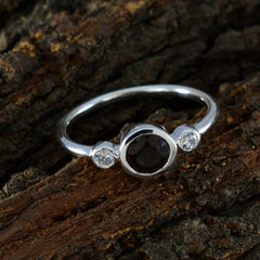 Wen brown trilogy gemstone ring with a central brown gemstone and two smaller clear stones on silver band