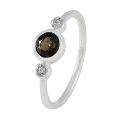 Wen brown trilogy gemstone ring with central brown gemstone and two side clear stones in silver band