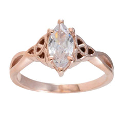 Claire rose gold Claddagh solitaire ring with a marquise cut clear gemstone and intricate side details