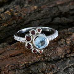 Ling silver ring with light blue center stone and red accent gems on pave band colorful party wear fashion ring