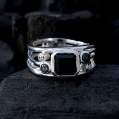Luisa contemporary black gemstone ring with square black onyx center and iridescent accent stones on silver band