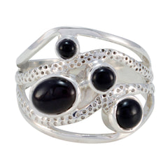 Pilar contemporary black gemstone ring with multiple black stones set in textured silver band