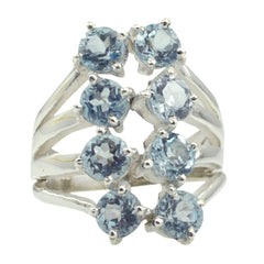Luisa contemporary blue gemstone ring with multiple round blue stones set in silver band