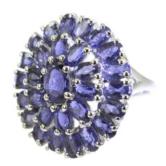 Priya contemporary blue gemstone ring with multiple oval blue stones in a floral cluster design