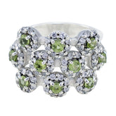 Tereza contemporary green gemstone ring with multiple green stones surrounded by clear crystals in silver setting