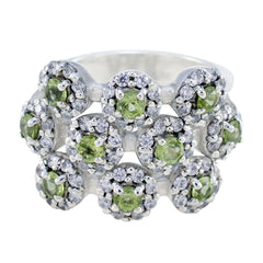 Tereza contemporary green gemstone ring with multiple green stones surrounded by clear crystals in silver setting