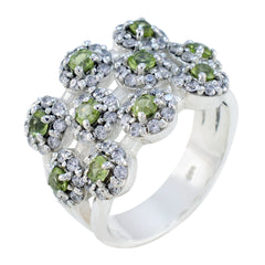 Tereza contemporary green gemstone ring with clustered green stones and clear accents in silver band
