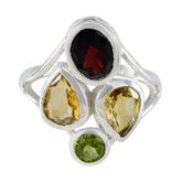 Isabella contemporary multicolor gemstone ring with red oval garnet two pear citrines and green peridot in silver