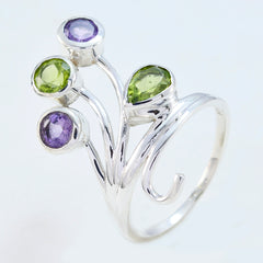 Natalie contemporary multicolor gemstone ring with purple and green stones set in silver band