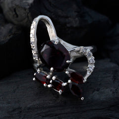 Sophia contemporary red gemstone ring featuring dark red stones and silver band with small clear accents