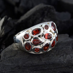 Daniela contemporary red gemstone ring with multiple red stones set in a silver band
