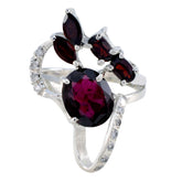 Sophia contemporary red gemstone ring with multiple red stones and silver band accented with small clear gems