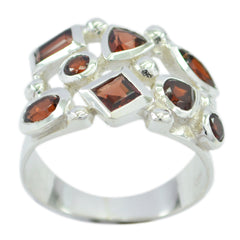 Charlotte contemporary red gemstone ring featuring multiple faceted red stones set in silver band